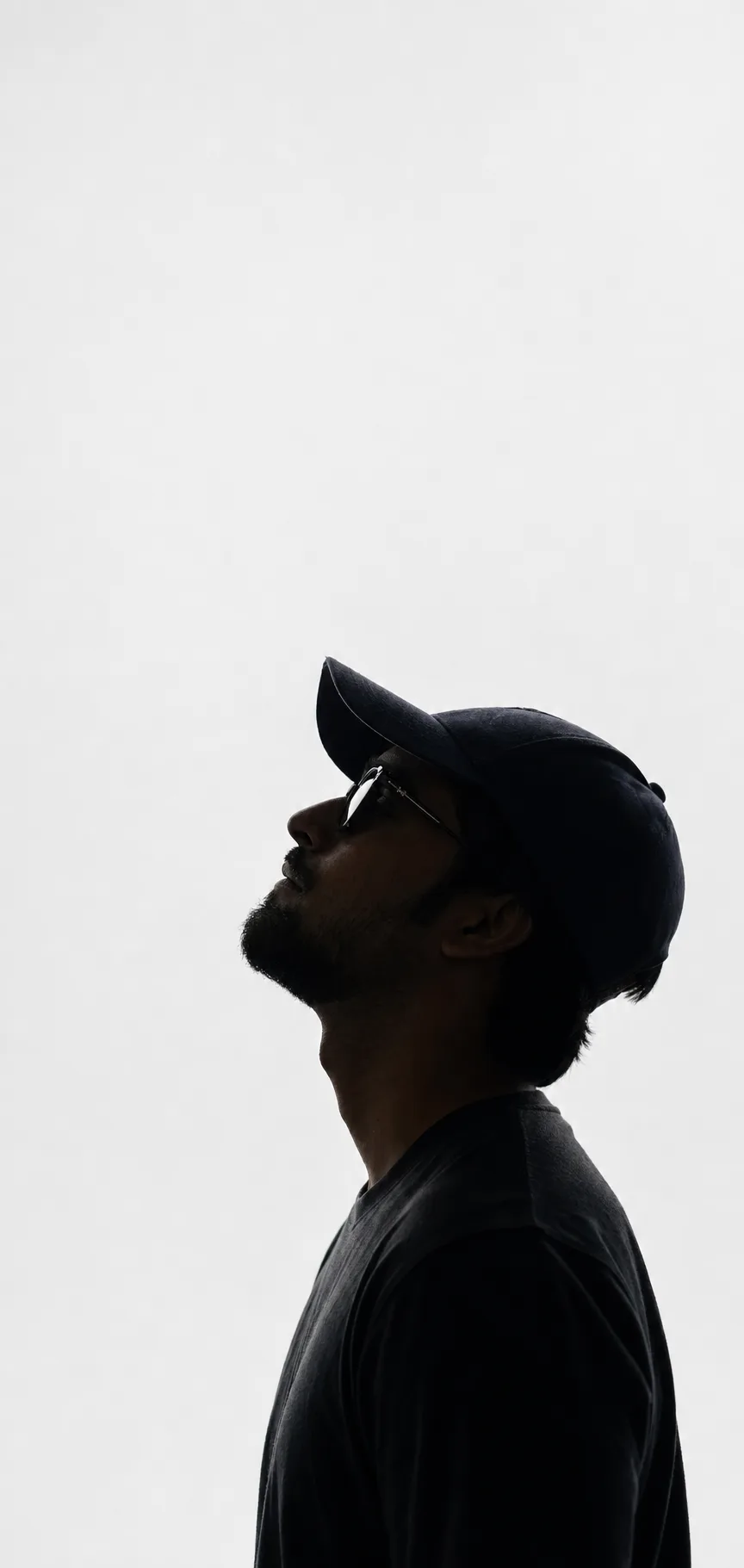 Side-profile portrait of Rahul Sharma looking upward